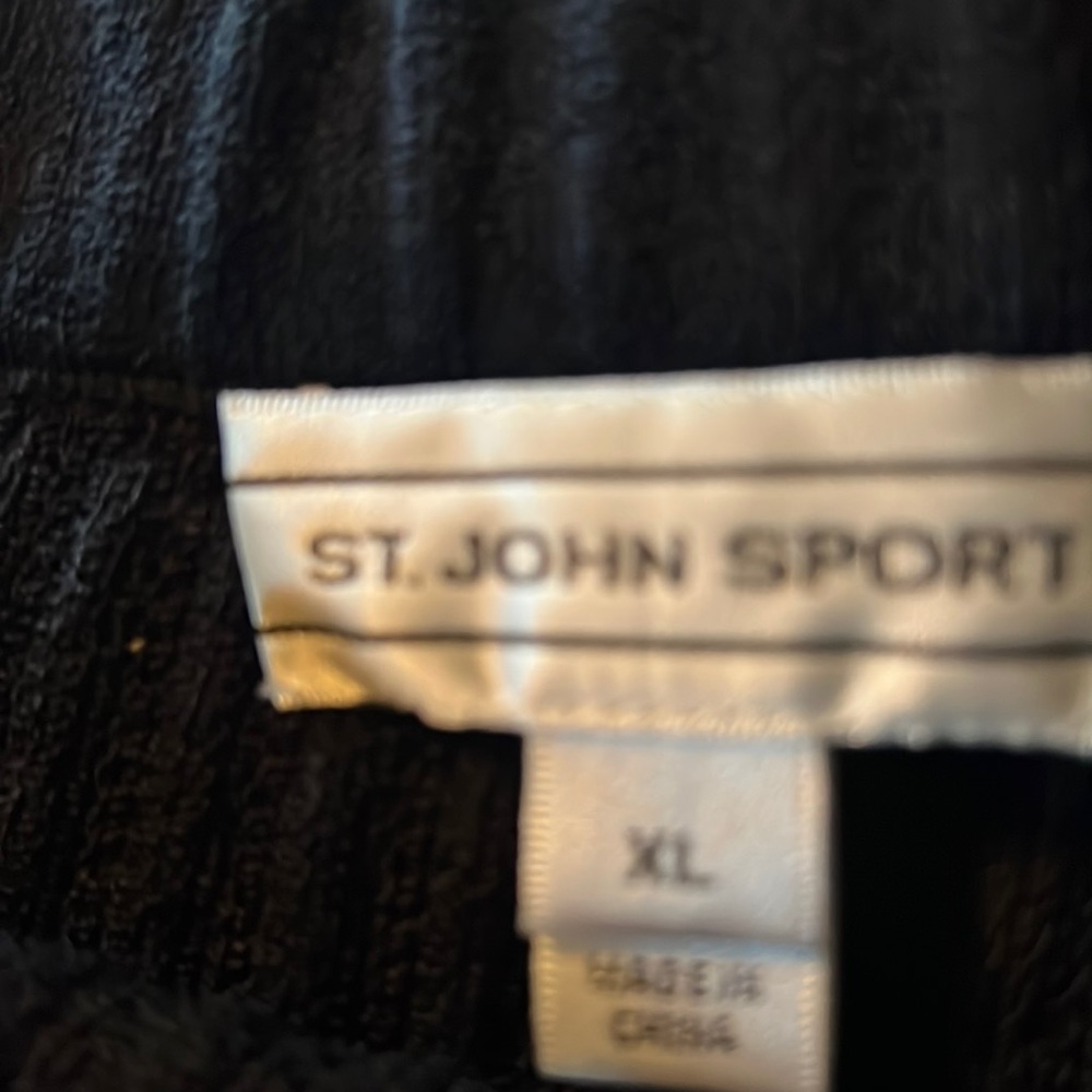 St John Knit.(Santana) Black Skirt. Fringe hem line.